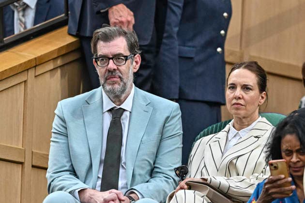 RECORD DATE NOT STATED 30th June 2026; All England Lawn Tennis and Croquet Club, London, England; Wimbledon Tennis Tournament, Day Two; Author and TV presenter Richard Osman with his actress wife Ingrid Oliver in the Royal Box GodfreyxPitt