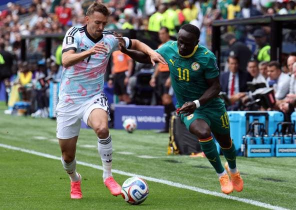 Belgium s Timothy Castagne and Senegal s Sadio Mane pictured in action during a soccer game between Belgian national team, Nationalteam Red Devils and Senegal, on Wednesday 01 July 2026, at the Seattle Field, in Seattle, a 1 16 finals game in the FIFA World Cup, WM, Weltmeisterschaft, Fussball 2026. BRUNOxFAHY  x180114523x