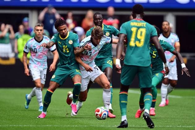 Senegal s Ismail Jakobs and Belgium s Charles De Ketelaere fight for the ball during a soccer game between Belgian national team, Nationalteam Red Devils and Senegal, on Wednesday 01 July 2026, at the Seattle Field, in Seattle, a 1 16 finals game in the FIFA World Cup, WM, Weltmeisterschaft, Fussball 2026. DIRKxWAEM  x180116380x