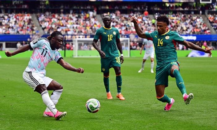Belgium s Jeremy Doku, Senegal s Sadio Mane and Senegal s Ismail Jakobs fight for the ball during a soccer game between Belgian national team, Nationalteam Red Devils and Senegal, on Wednesday 01 July 2026, at the Seattle Field, in Seattle, a 1 16 finals game in the FIFA World Cup, WM, Weltmeisterschaft, Fussball 2026. DIRKxWAEM  x180119760x