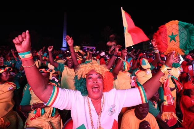 Senegal fans gather to watch World Cup in Dakar DAKAR, SENEGAL- JULY 02: Fans of Senegal cheer after their team scored as thousands of fans gather at Place de la Nation Square to watch the match on a giant screen, holding Senegal flags and wearing national team, Nationalteam jerseys in Dakar, Senegal, on July 02, 2026. Cem Ozdel Anadolu Dakar Senegal. Editorial use only. Please get in touch for any other usage.  Copyright: x2026xAnadoluxCemxOzdelx