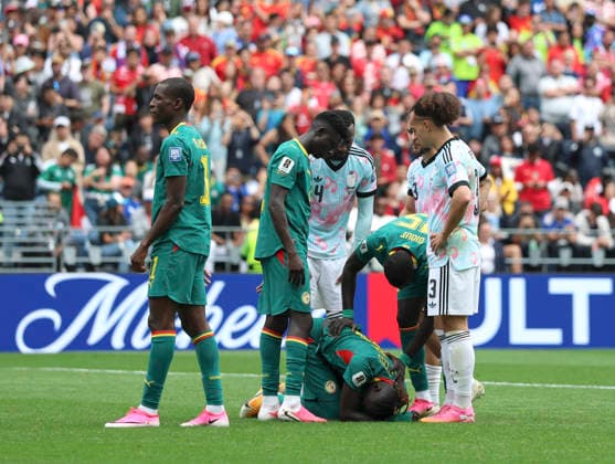 (260702) -- SEATTLE, July 2, 2026 -- Pathe Ciss of Senegal reacts after being injured during the round of 32 match between Belgium and Senegal at the 2026 FIFA World Cup, WM, Weltmeisterschaft, Fussball at Seattle Stadium in Seattle, the United States, July 1, 2026. ) (SP)U.S.-SEATTLE-FOOTBALL-FIFA WORLD CUP-ROUND OF 32-BEL VS SEN BaixXuefei 