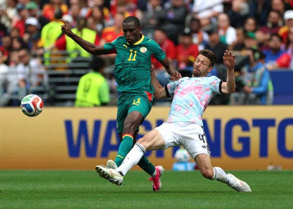 (260702) -- SEATTLE, July 2, 2026 -- Nicolas Jackson (L) of Senegal vies with Brandon Mechele of Belgium during the round of 32 match between Belgium and Senegal at the 2026 FIFA World Cup, WM, Weltmeisterschaft, Fussball at Seattle Stadium in Seattle, the United States, July 1, 2026. ) (SP)U.S.-SEATTLE-FOOTBALL-FIFA WORLD CUP-ROUND OF 32-BEL VS SEN MaoxSiqian 