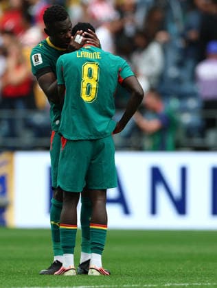 (260702) -- SEATTLE, July 2, 2026 -- Moussa Niakhate (back) of Senegal comforts his teammate Lamine Camara after the round of 32 match between Belgium and Senegal at the 2026 FIFA World Cup, WM, Weltmeisterschaft, Fussball at Seattle Stadium in Seattle, the United States, July 1, 2026. ) (SP)U.S.-SEATTLE-FOOTBALL-FIFA WORLD CUP-ROUND OF 32-BEL VS SEN MaoxSiqian 