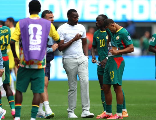 (260702) -- SEATTLE, July 2, 2026 -- Senegal s head coach Pape Thiaw (3rd R) gives instructions to players in a hydration break during the round of 32 match between Belgium and Senegal at the 2026 FIFA World Cup, WM, Weltmeisterschaft, Fussball at Seattle Stadium in Seattle, the United States, July 1, 2026. ) (SP)U.S.-SEATTLE-FOOTBALL-FIFA WORLD CUP-ROUND OF 32-BEL VS SEN MaoxSiqian 