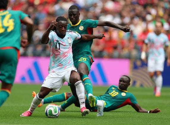 (260702) -- SEATTLE, July 2, 2026 -- Jeremy Doku (2nd L) of Belgium vies for the ball during the round of 32 match between Belgium and Senegal at the 2026 FIFA World Cup, WM, Weltmeisterschaft, Fussball at Seattle Stadium in Seattle, the United States, July 1, 2026. ) (SP)U.S.-SEATTLE-FOOTBALL-FIFA WORLD CUP-ROUND OF 32-BEL VS SEN MaoxSiqian 