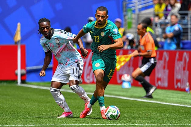July 01, 2026: Senegal midfielder Iliman Ndiaye (13) moves the ball ahead of Belgium midfielder Jo ro my Doku (11) during the FIFA World Cup, WM, Weltmeisterschaft, Fussball knockout round of 32 match between Belgium and Senegal in Seattle, WA.Belgium defeated Senegal 3-2 on a penalty kick near the end of the second overtime period. CSM Seattle United States - ZUMAc04_ 20260701_zma_c04_067 Copyright: xStevexFaberx