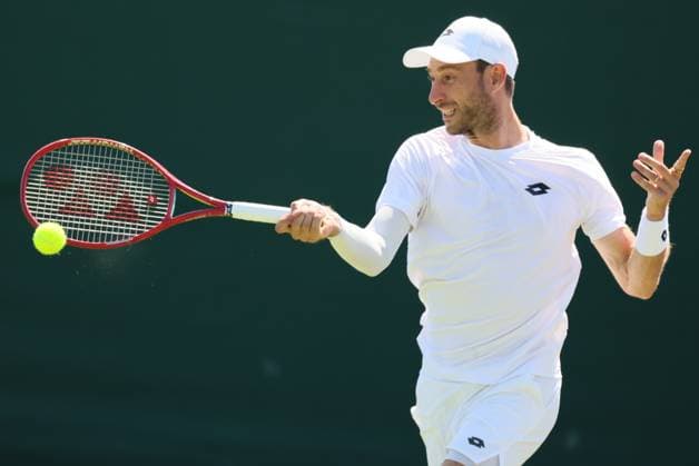 Belgian Sander Gille pictured in action during a first round game between Indian-Brazilian pair Balaji-Demoliner and Belgian-Dutch pair Gille-Verbeek in the Men s doubles at the Wimbledon grand slam tennis tournament in London, Britain, Thursday 02 July 2026. BENOITxDOPPAGNE  x180158946x