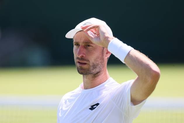 Belgian Sander Gille reacts during a first round game between Indian-Brazilian pair Balaji-Demoliner and Belgian-Dutch pair Gille-Verbeek in the Men s doubles at the Wimbledon grand slam tennis tournament in London, Britain, Thursday 02 July 2026. BENOITxDOPPAGNE  x180163096x