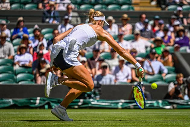 RECORD DATE NOT STATED 2nd July 2026; All England Lawn Tennis and Croquet Club, London, England; Wimbledon Tennis Tournament, Day Four; Katie Swan (GBR) plays a low volley in her second round match against Madison Keys (USA) GodfreyxPitt