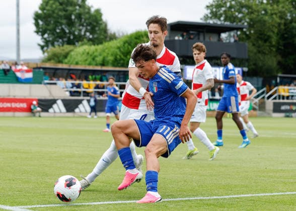 Caernarfon, Wales, 2nd July 2026. Marko Zebic of Croatia and Mattia Mosconi of Italy battle for the ball during the Croatia U19 vs Italy U19 UEFA European U19 Championship match at The Oval, Caernarfon. Picture credit should read: Cody Froggatt Sportimage EDITORIAL USE ONLY. No use with unauthorised audio, video, data, fixture lists, club league logos or live services. Online in-match use limited to 120 images, no video emulation. No use in betting, games or single club league player publications. SPI_009_CF_CROATIA_U19_V_ITALY_U19 SPI-4850-0009