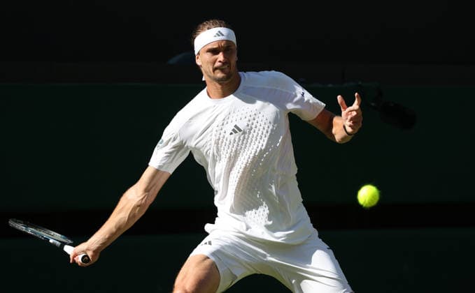Germany s Alexander Zverev plays a forehand in his match against France s Valentin Royer at Wimbledon on day four of the 2026 Wimbledon Championships in London on Thursday, July 02, 2026. Zverev won the match 6-1,6-3,7-6.  LON2026070267 HUGOxPHILPOTT