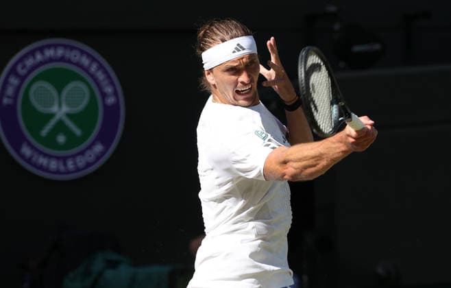 Germany s Alexander Zverev plays a forehand in his match against France s Valentin Royer at Wimbledon on day four of the 2026 Wimbledon Championships in London on Thursday, July 02, 2026. Zverev won the match 6-1,6-3,7-6.  LON2026070269 HUGOxPHILPOTT