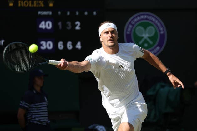 Germany s Alexander Zverev plays a forehand in his match against France s Valentin Royer at Wimbledon on day four of the 2026 Wimbledon Championships in London on Thursday, July 02, 2026. Zverev won the match 6-1,6-3,7-6.  LON2026070270 HUGOxPHILPOTT