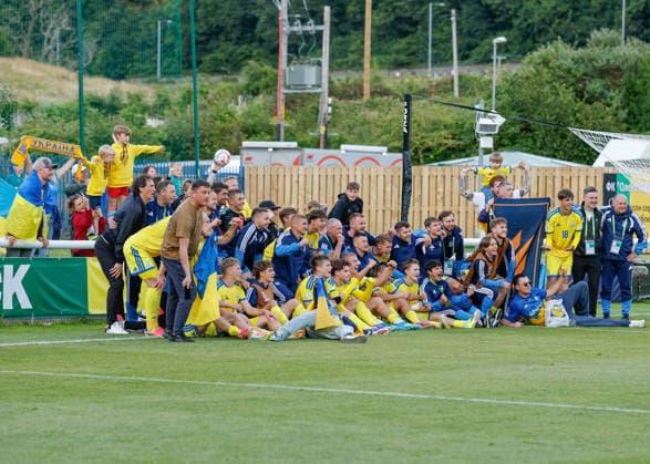 Bangor, Wales, 2nd July 2026. Players and coaches of Ukraine celebrate the full time result following the Serbia U19 vs Ukraine U19 UEFA European U19 Championship match at Bangor City Stadium, Bangor. Picture credit should read: Cody Froggatt Sportimage EDITORIAL USE ONLY. No use with unauthorised audio, video, data, fixture lists, club league logos or live services. Online in-match use limited to 120 images, no video emulation. No use in betting, games or single club league player publications. SPI_023_CF_SERBIA_U19_V_UKRAINE_U19 SPI-4851-0023