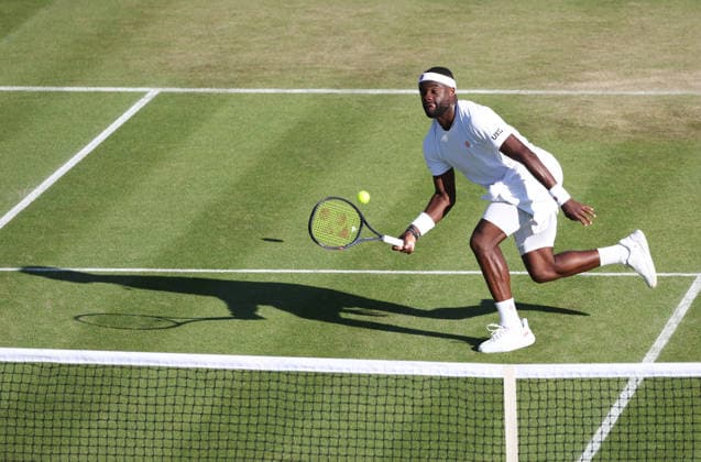 American Frances Tiafoe runs for the ball in his match against Britain s Jan Choinski at Wimbledon on day four of the 2026 Wimbledon Championships in London on Thursday, July 02, 2026.  LON2026070277 HUGOxPHILPOTT