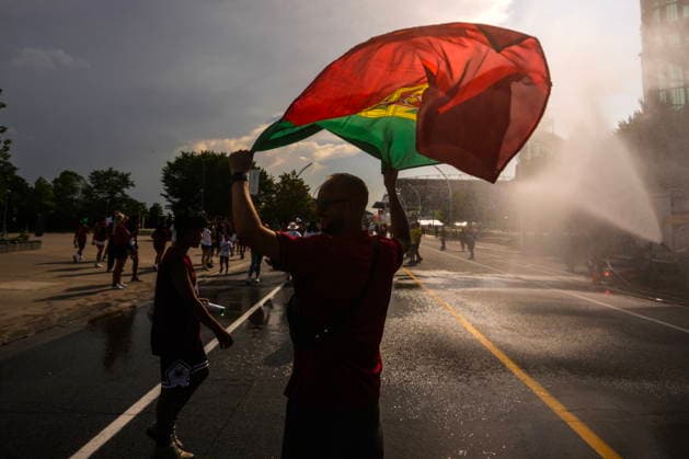 July 2, 2026, Toronto, On, CAN: A Portugal fan runs through a water jet, as fans try and cool off as they arrive for a FIFA 2026 World Cup round of 32 match between Portugal and Croatia in Toronto on Thursday, July 2, 2026. Canada News - July 2, 2026  - ZUMAc35_ 20260702_zaf_c35_057 Copyright: xChrisxYoungx