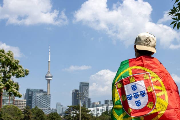 Portuguese fans in Toronto TORONTO, OT - 02.07.2026: PORTUGUESE FANS IN TORONTO - Portuguese fans take to the streets of Toronto in a festive atmosphere ahead of the match between Portugal and Croatia, wearing red and green, carrying flags and celebrating their passion for football. (Photo: R Vasconcelos Fotoarena) x2977481x  RxVasconcelos