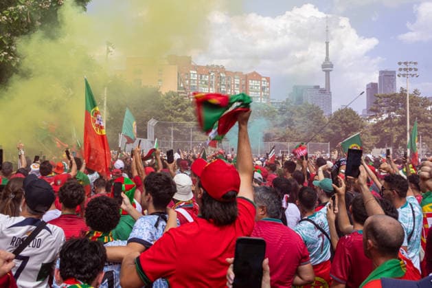 Portuguese fans in Toronto TORONTO, OT - 02.07.2026: PORTUGUESE FANS IN TORONTO - Portuguese fans take to the streets of Toronto in a festive atmosphere ahead of the match between Portugal and Croatia, wearing red and green, carrying flags and celebrating their passion for football. (Photo: R Vasconcelos Fotoarena) x2977490x  RxVasconcelos