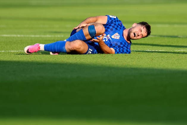Portugal v Croatia: Round Of 32 - FIFA World Cup, WM, Weltmeisterschaft, Fussball 2026 Martin Baturina of Croatia lies on the pitch during the FIFA World Cup 2026 Round Of 32 match between Portugal and Croatia at Toronto Stadium on July 2, 2026 in Toronto, Canada.  SanjinxStrukic PIXSELL