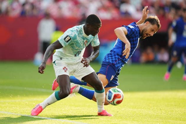 July 2, 2026, Toronto, On, CANADA: Croatia s Nikola Vlasic (right) is tripped up by Portugal s Nuno Mendes (25) during the first half of a World Cup round of 32 soccer match, in Toronto on Thursday, July 2, 2026. Canada News - July 2, 2026  - ZUMAc35_ 20260702_zaf_c35_124 Copyright: xNathanxDenettex