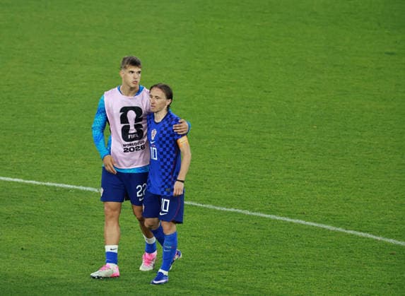 (260703) -- TORONTO, July 3, 2026 -- Luka Vuskovic (L) of Croatia comforts his teammate Luka Modric after the round of 32 match between Portugal and Croatia at the 2026 FIFA World Cup, WM, Weltmeisterschaft, Fussball at Toronto Stadium in Toronto, Canada, July 2, 2026. (Photo by Xinhua) (SP)CANADA-TORONTO-FOOTBALL-FIFA WORLD CUP-ROUND OF 32-POR VS CRO YangxShu 
