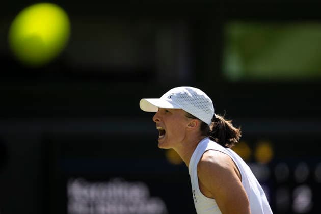 (260703) -- LONDON, July 3, 2026 -- Iga Swiatek of Poland reacts during the women s singles second round match against Karolina Pliskova of the Czech Republic at the Wimbledon Tennis Championships in London, Britain, on July 2, 2026. (Photo by Xinhua) (SP)BRITAIN-LONDON-TENNIS-WIMBLEDON-WOMEN S SINGLES StephenxChung 