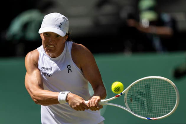 (260703) -- LONDON, July 3, 2026 -- Iga Swiatek of Poland returns the ball during the women s singles second round match against Karolina Pliskova of the Czech Republic at the Wimbledon Tennis Championships in London, Britain, on July 2, 2026. (Photo by Xinhua) (SP)BRITAIN-LONDON-TENNIS-WIMBLEDON-WOMEN S SINGLES StephenxChung 