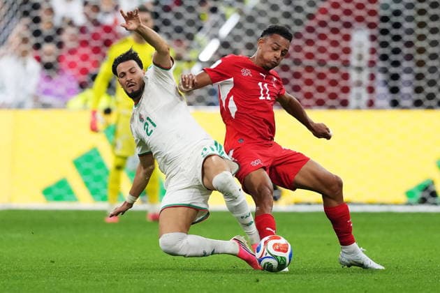 July 2, 2026, Vancouver, Bc, CANADA: Algeria s Ramy Bensebaini (21) and Switzerland s Dan Ndoye (11) vie for the ball during the first half of a World Cup Round of 32 soccer match, in Vancouver, on Thursday, July 2, 2026. Canada News - July 2, 2026  - ZUMAc35_ 20260702_zaf_c35_330 Copyright: xEthanxCairnsx