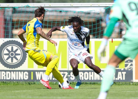 SOCCER - Sturm vs Kosice, test match IRDNING,AUSTRIA,03.JUL.26 - SOCCER - ADMIRAL Bundesliga, Nike liga, SK Sturm Graz vs FC Kosice, test match. Image shows Bojan Damjanovic (Kosice) and Seedy Jatta (Sturm).  GEPAxpictures xHaraldxSteiner