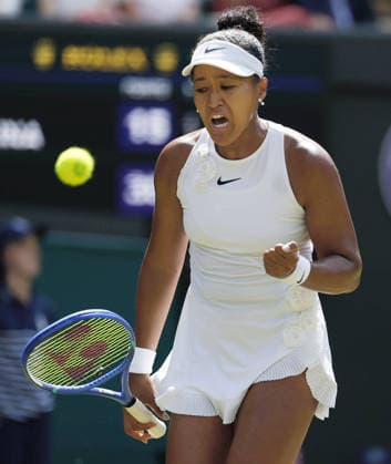 Tennis: Wimbledon championships Naomi Osaka of Japan reacts after earning a point against Daria Kasatkina of Australia in the women s singles third round at the Wimbledon tennis tournament in London on July 3, 2026.  A14AA0005621495P