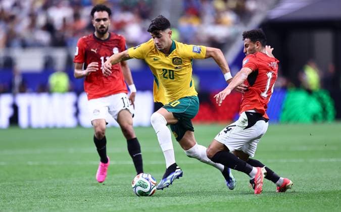 Cristian Volpato of Australia and Hamdi Fathy of Egypt Australia v Egypt, 2026 FIFA World Cup, WM, Weltmeisterschaft, Fussball Round of 32, Football, Dallas Stadium, Arlington, Texas, USA - 03 Jul 2026Arlington Dallas Stadium Texas (TX) United States of America  Copyright: xMichaelxZemanek Shutterstockx 16975786aa