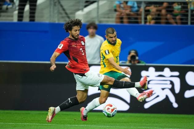 Australia v Egypt Round of 32 - FIFA World Cup, WM, Weltmeisterschaft, Fussball 2026 ARLINGTON, TEXAS JULY 3, 2026: Egypt s Mohamed Hany ( 3) clears the ball ahead of Australia s Aziz Behich ( 16) during the FIFA World Cup 2026 Round of 32 match at Dallas Stadium in Arlington, Texas, United States, on July 3, 2026. ( ARLINGTON United States of America Copyright: x xAymanxArefxMohamedxSaadxElxDinx xJNAxPressx