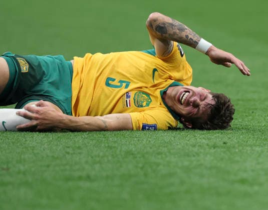 (260704) -- DALLAS, July 4, 2026 -- Jordan Bos of Australia falls down during the round of 32 match between Australia and Egypt at the 2026 FIFA World Cup, WM, Weltmeisterschaft, Fussball at Dallas Stadium in Dallas, the United States, July 3, 2026. ) (SP)U.S.-DALLAS-FOOTBALL-FIFA WORLD CUP-ROUND OF 32-AUS VS EGY LixYing 