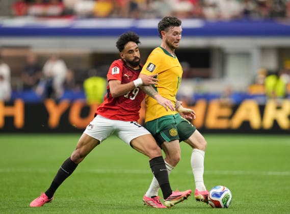 (260704) -- DALLAS, July 4, 2026 -- Marawan Attia (L) of Egypt vies with Aiden O Neill of Australia during the round of 32 match between Australia and Egypt at the 2026 FIFA World Cup, WM, Weltmeisterschaft, Fussball at Dallas Stadium in Dallas, the United States, July 3, 2026. ) (SP)U.S.-DALLAS-FOOTBALL-FIFA WORLD CUP-ROUND OF 32-AUS VS EGY WuxXiaoling 
