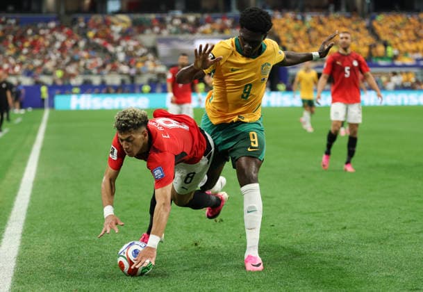 (260704) -- DALLAS, July 4, 2026 -- Emam Ashour (L) of Egypt vies with Mohamed Toure of Australia during the round of 32 match between Australia and Egypt at the 2026 FIFA World Cup, WM, Weltmeisterschaft, Fussball at Dallas Stadium in Dallas, the United States, July 3, 2026. ) (SP)U.S.-DALLAS-FOOTBALL-FIFA WORLD CUP-ROUND OF 32-AUS VS EGY LixYing 