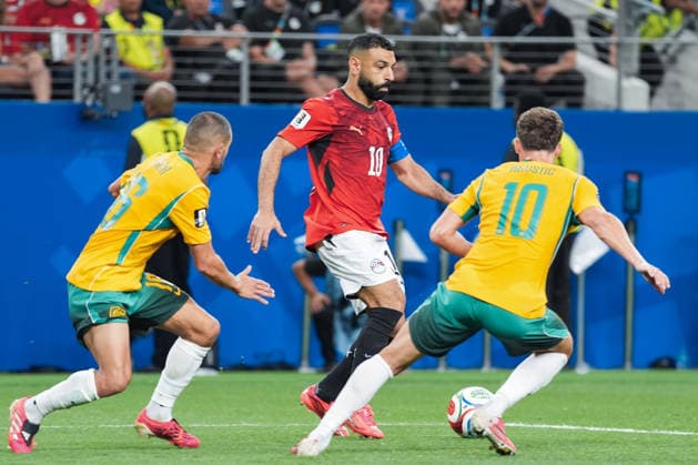 Mohamed Salah of Egypt (C) runs with the ball under pressure from Ajdin Hrustic of Australia (R) during a FIFA Men’s World Cup 2026 round of 32 football match between Australia and Egypt at Dallas Stadium, in Arlington on July 03 2026 (Photo by LVDIDI SPP)  Copyright: xLVDIDI SPPx Sportspressphoto_SPR184172