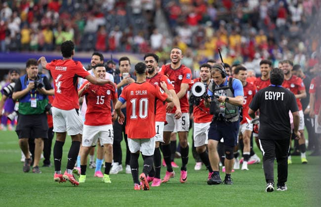 (260704) -- DALLAS, July 4, 2026 -- Members of Egypt celebrate victory after the round of 32 match between Australia and Egypt at the 2026 FIFA World Cup, WM, Weltmeisterschaft, Fussball at Dallas Stadium in Dallas, the United States, July 3, 2026. ) (SP)U.S.-DALLAS-FOOTBALL-FIFA WORLD CUP-ROUND OF 32-AUS VS EGY LixYing 