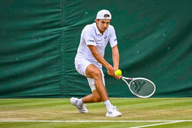 RECORD DATE NOT STATED 4th July 2026; All England Lawn Tennis and Croquet Club, London, England; Wimbledon Tennis Tournament, Day Six; Zachary Svajda (USA) plays a backhand in his third round match against Alex De Minaur (AUS) GodfreyxPitt