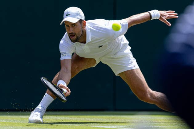 Novak Djokovic (SRB) in action during his match against Arthur Rinderknech (FRA) in the 2026 Wimbledon Championships at the AELTC London London All England Lawn Tennis and Croquet Club Wimbledon England, UK NEWSPAPERS OUT Copyright: xImmyxThompson-Bland IPSxPhotoxAgencyx