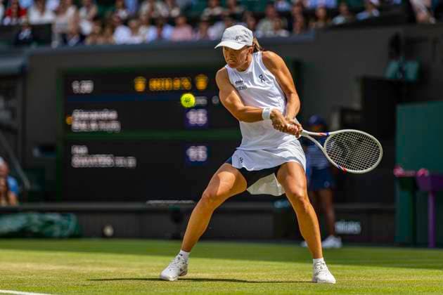 RECORD DATE NOT STATED 4th July 2026; All England Lawn Tennis and Croquet Club, London, England; Wimbledon Tennis Tournament, Day Six; Iga Swiatek (POL) plays a backhand in her third round match against Alexandra Eala (PHI) GodfreyxPitt