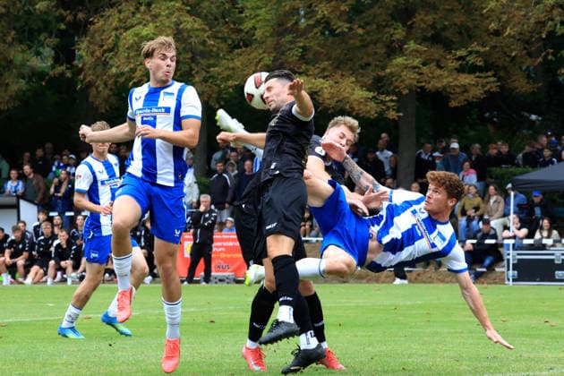 DEU, DFL, 2. FBL, Frohnauer SC vs Hertha BSC, 04.07.2026, Frohnau, Berlin, DEU, DFL, 2. FBL, Frohnauer SC vs Hertha BSC, Sebastian Groenning (Hertha BSC Berlin 17), Niklas Hildebrandt (Hertha BSC Berlin 26), Tobias Normen Hampel (Frohnauer SC 17) DFL - regulations prohibit any use of Photographs as image sequences and or quasi-video *** GER, DFL, 2nd FBL, Frohnauer SC vs. Hertha BSC, July 4, 2026, Frohnau, Berlin, GER, DFL, 2nd Regional League, Frohnauer SC vs. Hertha BSC, Sebastian Groenning (Hertha BSC Berlin) 17, Niklas Hildebrandt (Hertha BSC Berlin) 26, Tobias Normen Hampel (Frohnauer SC) 17. DFL regulations prohibit any use of photographs as image sequences and or quasi-video. nordphotoxGmbHx xEngler nph00076