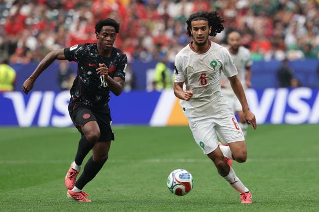FIFA World Cup, WM, Weltmeisterschaft, Fussball 2026 - Round of 16 - Canada vs Morocco Jonathan David (L) of Canada in action against Ayyoub Bouaddi of Morocco during the FIFA World Cup 2026 Round of 16 match Canada against Morocco, in Houston, USA, 04 July 2026. HOUSTON United States  Copyright: xCHRISTOPHERxNEUNDORFx