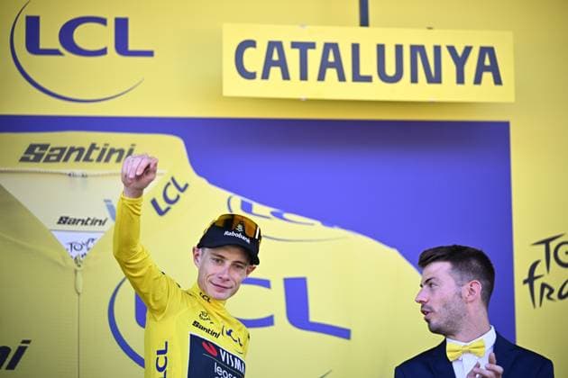 Danish Jonas Vingegaard of Team Visma-Lease a Bike celebrates on the podium in the yellow jersey of leader in the overall ranking after the first stage of the 2026 Tour de France cycling race, a team time trial of 19km with start and finish in Barcelona, Spain, Saturday 04 July 2026. The 113th edition of the Tour de France starts on Saturday 4 July in Barcelona, Spain, and will finish in Paris, France on the 26th of July. JASPERxJACOBS  x180371934x