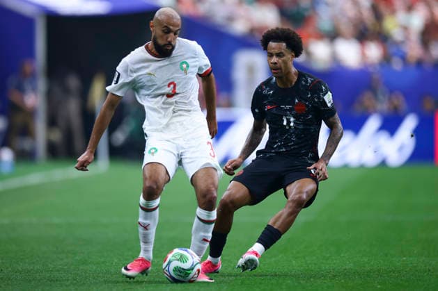 Canada Tajon Buchanan (R) vies for the ball against Morocco s Noussair Mazraoui during the FIFA World Cup, WM, Weltmeisterschaft, Fussball 2026 Round of 16 soccer match between Morocco and Canada at Houston Stadium, in United States, 4 July 2026. Canada - Morocco !ACHTUNG: NUR REDAKTIONELLE NUTZUNG!  Copyright: xCarlosxRamírezx GRAF1195 20260704-55020801152_1