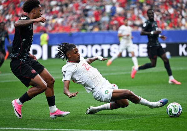 (260705) -- HOUSTON, July 5, 2026 -- Redouane Halhal (R) of Morocco competes during the round of 16 match between Canada and Morocco at the 2026 FIFA World Cup, WM, Weltmeisterschaft, Fussball at Houston Stadium in Houston, the United States, July 4, 2026. ) (SP)U.S.-HOUSTON-FOOTBALL-FIFA WORLD CUP-ROUND OF 16-CAN VS MAR XiaoxYijiu 