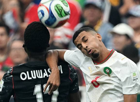 (260705) -- HOUSTON, July 5, 2026 -- Azzedine Ounahi (R) of Morocco competes with Tani Oluwaseyi of Canada during the round of 16 match between Canada and Morocco at the 2026 FIFA World Cup, WM, Weltmeisterschaft, Fussball at Houston Stadium in Houston, the United States, July 4, 2026. ) (SP)U.S.-HOUSTON-FOOTBALL-FIFA WORLD CUP-ROUND OF 16-CAN VS MAR XiaoxYijiu 
