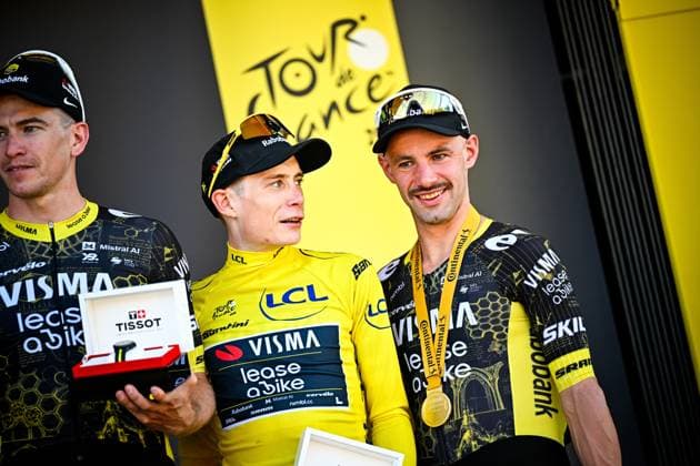 Danish Jonas Vingegaard of Team Visma-Lease a Bike and Belgian Victor Campenaerts of Team Visma-Lease a Bike celebrate on the podium after winning the first stage of the 2026 Tour de France cycling race, a team time trial of 19km with start and finish in Barcelona, Spain, Saturday 04 July 2026. The 113th edition of the Tour de France starts on Saturday 4 July in Barcelona, Spain, and will finish in Paris, France on the 26th of July. JASPERxJACOBS  x180374031x