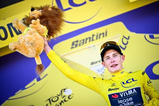 Danish Jonas Vingegaard of Team Visma-Lease a Bike celebrates on the podium after winning the first stage of the 2026 Tour de France cycling race, a team time trial of 19km with start and finish in Barcelona, Spain, Saturday 04 July 2026. The 113th edition of the Tour de France starts on Saturday 4 July in Barcelona, Spain, and will finish in Paris, France on the 26th of July. JASPERxJACOBS  x180374055x