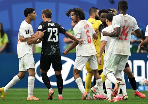 (260705) -- HOUSTON, July 5, 2026 -- Players of both sides clash during the round of 16 match between Canada and Morocco at the 2026 FIFA World Cup, WM, Weltmeisterschaft, Fussball at Houston Stadium in Houston, the United States, July 4, 2026. ) (SP)U.S.-HOUSTON-FOOTBALL-FIFA WORLD CUP-ROUND OF 16-CAN VS MAR XiaoxYijiu 